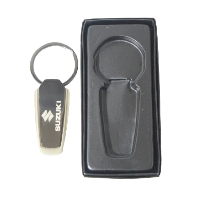 Suzuki genuine key chain with a metallic rectangle design featuring the Suzuki logo.